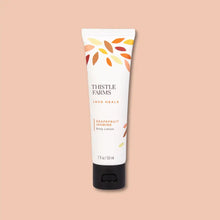 Load image into Gallery viewer, Grapefruit Jasmine Body Lotion Mini 2 oz | Moringa &amp; Coconut
